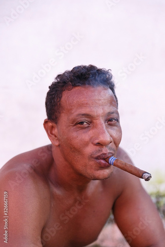 Photography man smoking a cigar , trinidad - cuba