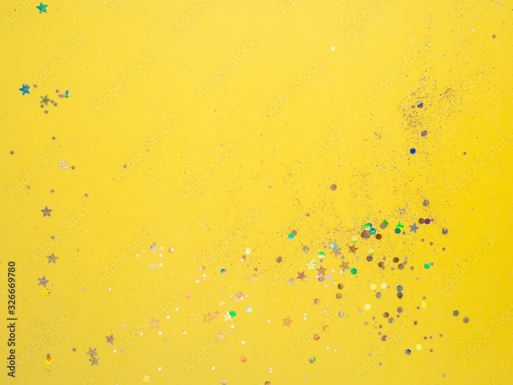 yellow background with colorful confetti
