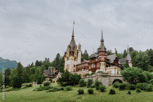 PELES IS A NEO-RENAISSANCE CASTLE IN THE CARPATHIAN MOUNTAINS, NEAR SINAIA, IN PRAHOVA COUNTY, ROMANIA, ON AN EXISTING MEDIEVAL ROUTE LINKING TRANSYLVANIA AND WALLACHIA, BUILT BETWEEN 1873 AND 1914