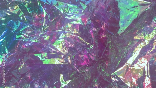 transparent shiny holographic foil abstract pattern background 