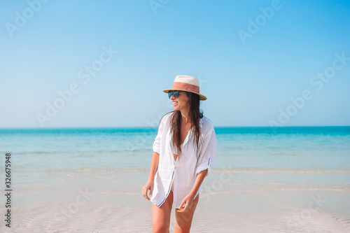 Wallpaper Mural Young fashion woman in green dress on the beach Torontodigital.ca