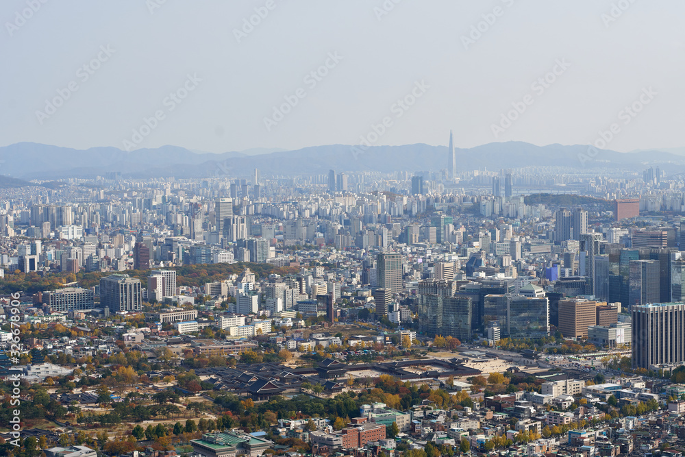 Aerial panorama of the Gyeongbokgung palace and downtown with skyscrapers in Seoul in South Korea.
Aerial panorama of the Gyeongbokgung palace and downtown with skyscrapers in Seoul in South Korea.