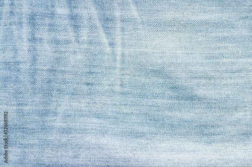 Retro color tone of blue denim jeans fabric texture for background website fashion design or backdrop product.