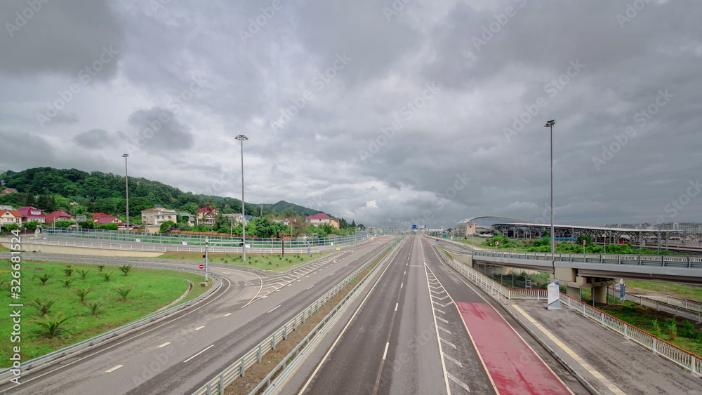 Fototapeta premium Traffic on Road M-27 timelapse Sochi Adler, Russia