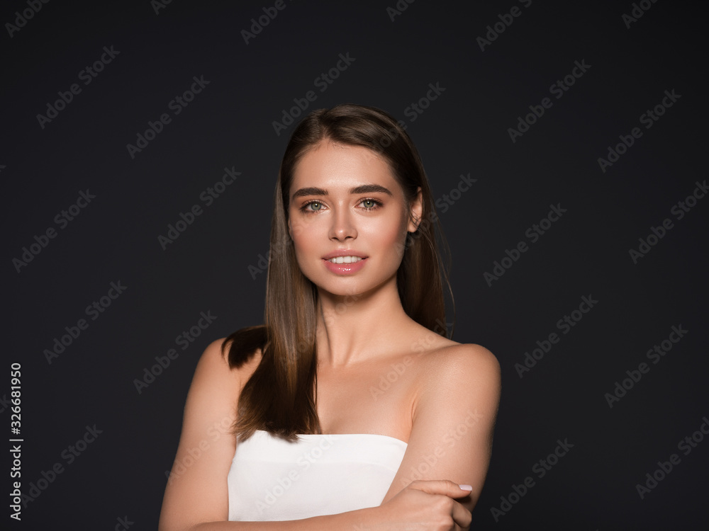 Beauty woman natural skin hair Studio shot of a beautiful young woman posing against a Beauty woman natural skin hair Studio shot of a beautiful young woman posing against a