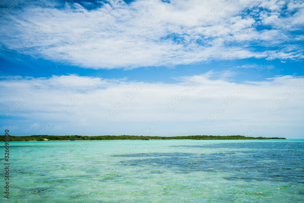 Paradise island and turquoise waters at the Caribbean. Los Roques National Park, Venezuela Paradise island and turquoise waters at the Caribbean. Los Roques National Park, Venezuela
