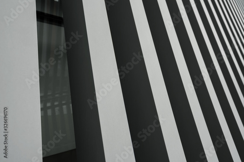 A metallic background with gray stripes