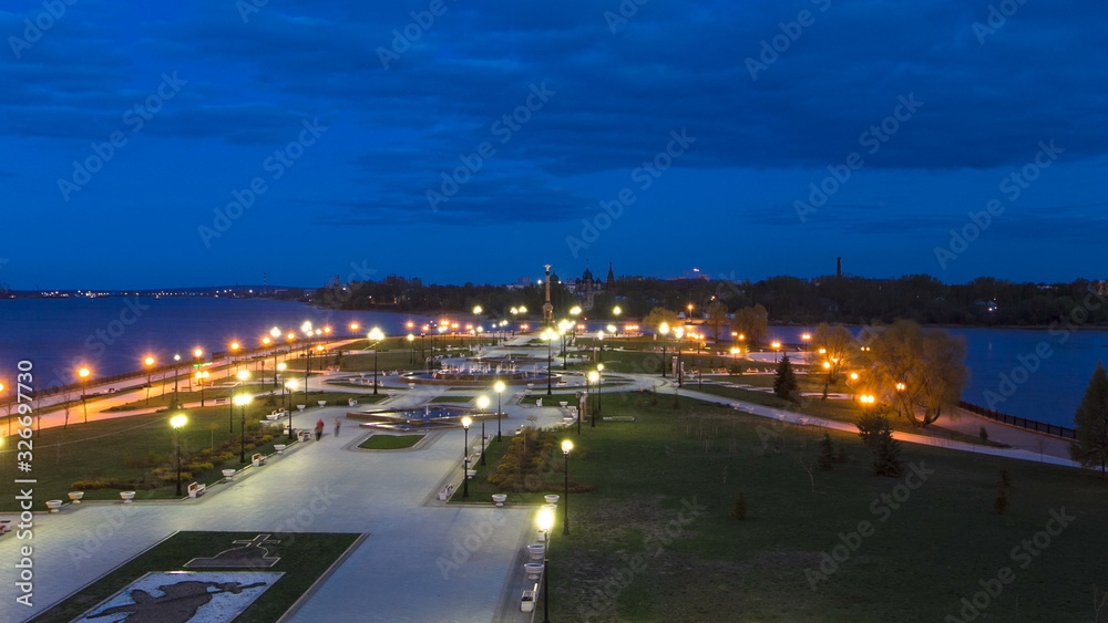 View of the city park strelka in Yaroslavl located along the Volga river embankment day to night timelapse