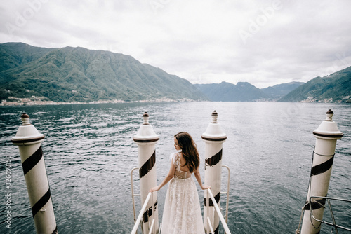 Young caucasian bride on Como lake  in Italy © olegzaicev