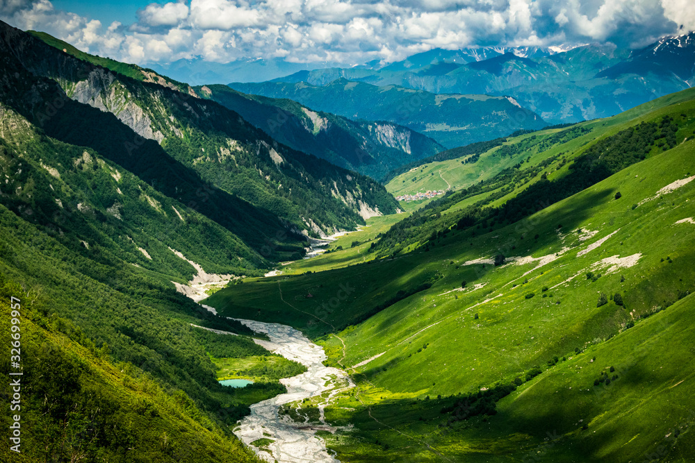 Colorful summer landscape of Adishi valley seen from Chkhutnieri pass, Upper Svaneti, Georgia.