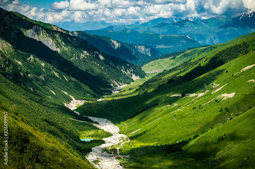 Colorful summer landscape of Adishi valley seen from Chkhutnieri pass, Upper Svaneti, Georgia. © Maritxu22