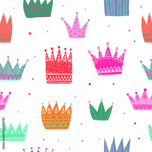 Colorful crowns seamless pattern. Tiaras repeated print. Girlish repeat ornament for fashion textile, clothes, wrapping paper. Princess elements