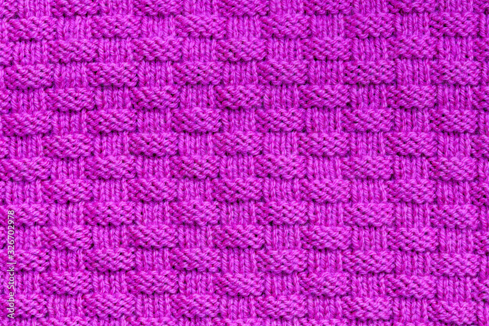 Abstract textured background of pink knitting Abstract textured background of pink knitting