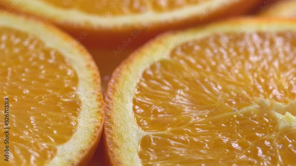 Marco shot of orange fruit and rotate.Close up flesh citrus orange. Nature background. Marco shot of orange fruit and rotate.Close up flesh citrus orange. Nature background.