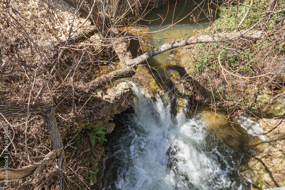 The rapid, shallow, cold mountain Ayun river in the Galilee in northern Israel The rapid, shallow, cold mountain Ayun river in the Galilee in northern Israel