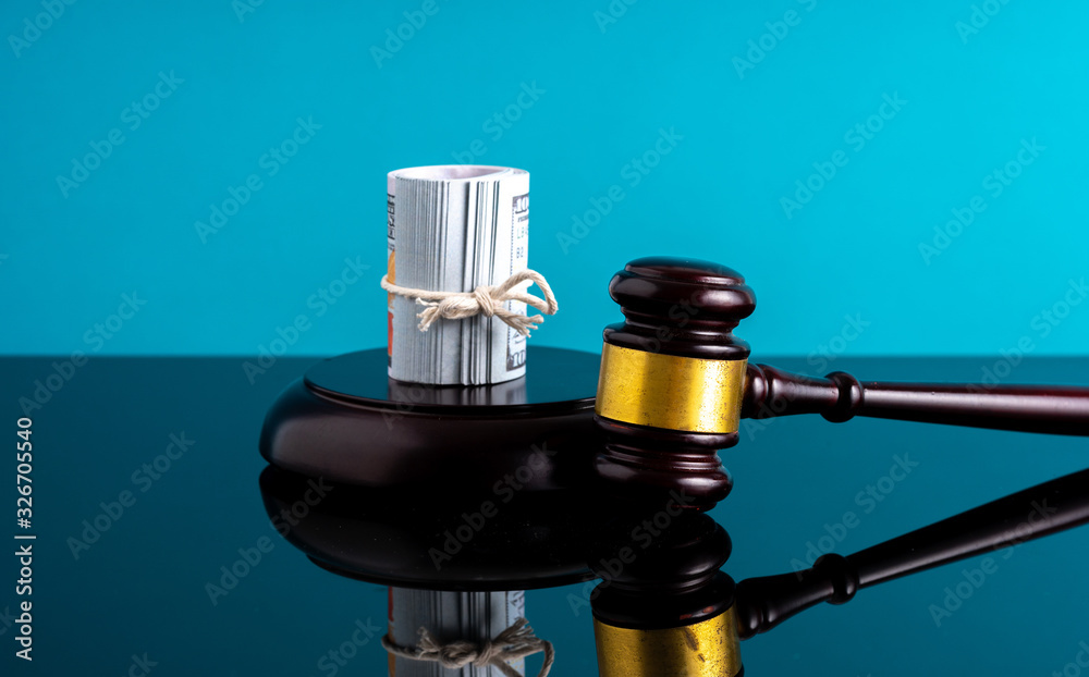 Banknotes with gavel hammer with law concept. Banknotes with gavel hammer with law concept.