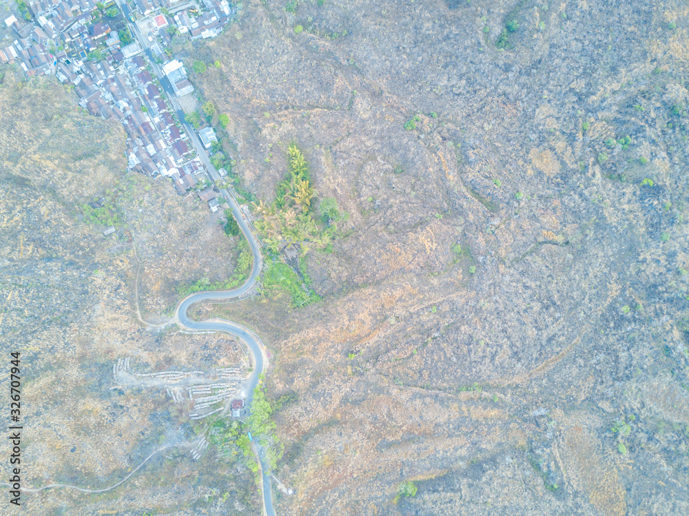 Aerial view of street village at mountain hill Aerial view of street village at mountain hill