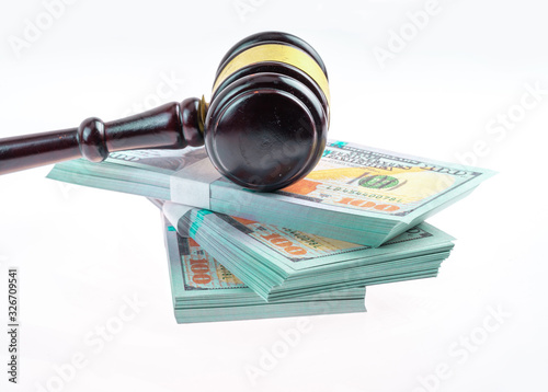 Gavel hammer and banknote with white background