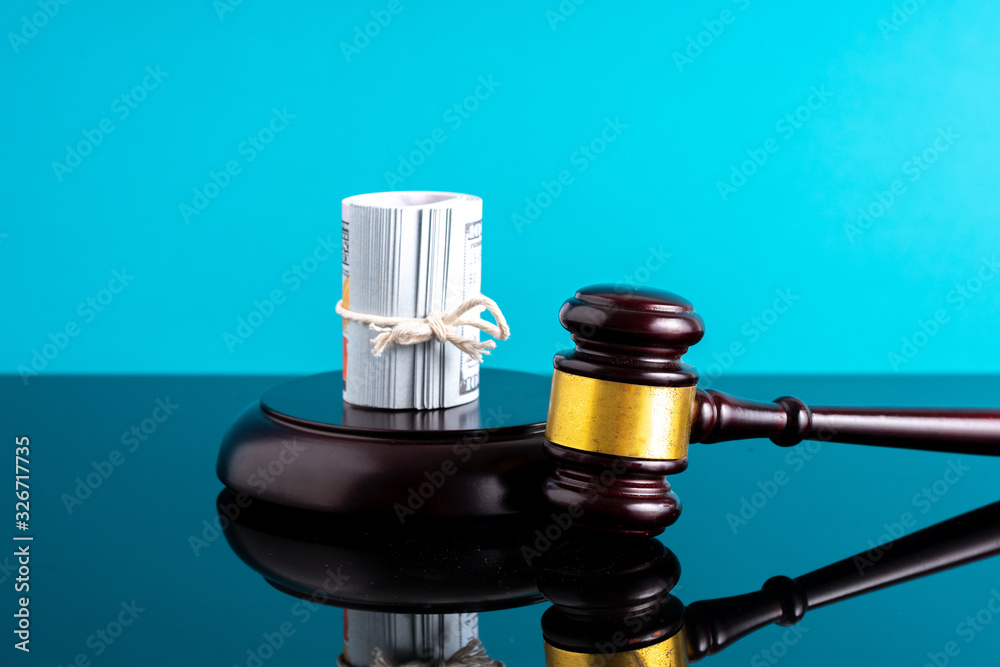 Gavel hammer and banknote with financial concept. Gavel hammer and banknote with financial concept.