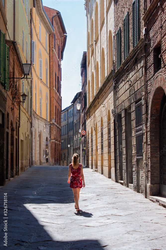 Siena girl walk in the city