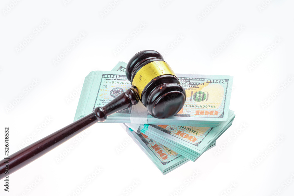 Gavel hammer and banknote with white background