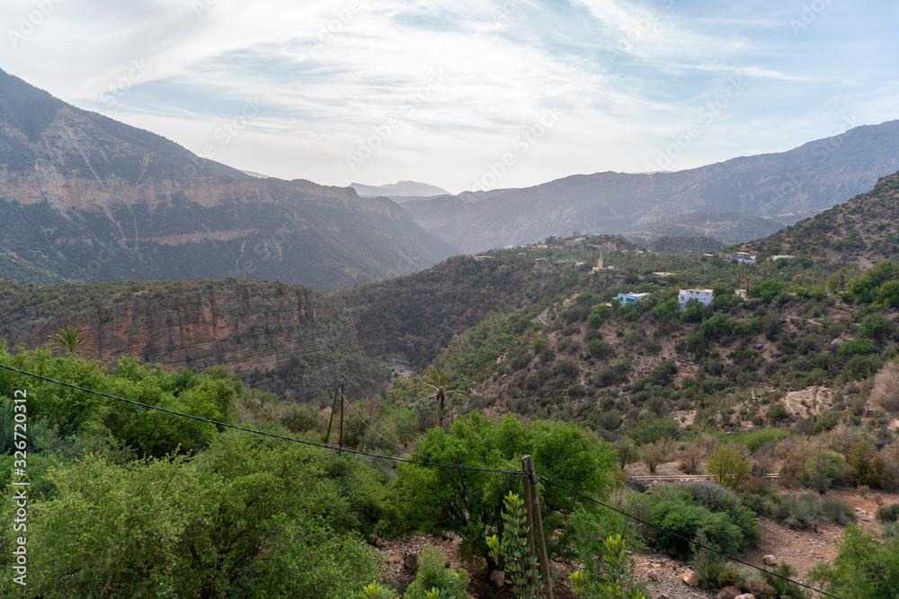 Landscape of Paradise Valley during spring time in Morocco. Fresh trees, mountains in the background.