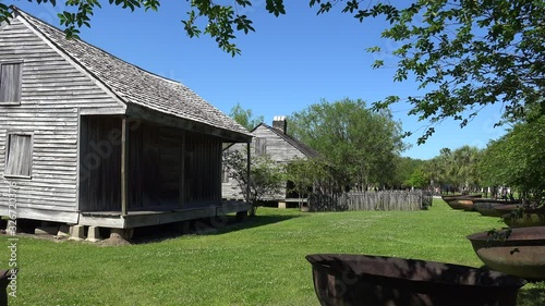 Typical  slave houses & old sugar kettles in Whitney Plantation. Vacherie, Louisiana, USA photo