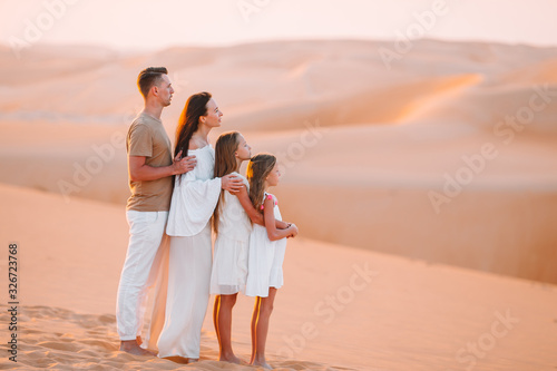 People among dunes in Rub al-Khali desert in United Arab Emirates © travnikovstudio