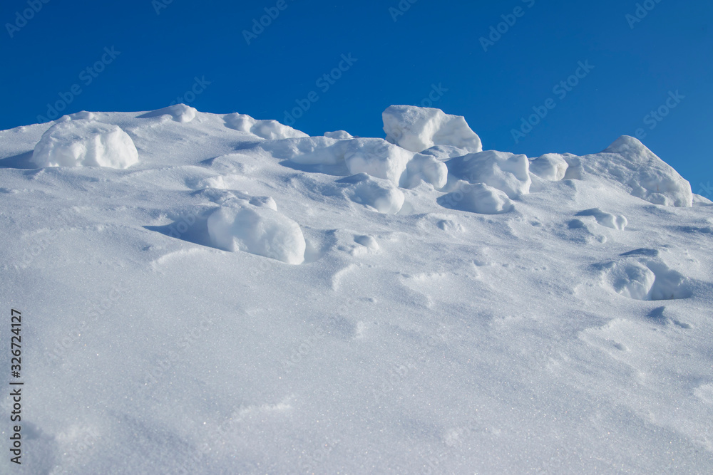 Snowdrift. Snow drift. Applied wind a large pile of snow during blizzards and snow fal Snowdrift. Snow drift. Applied wind a large pile of snow during blizzards and snow fal