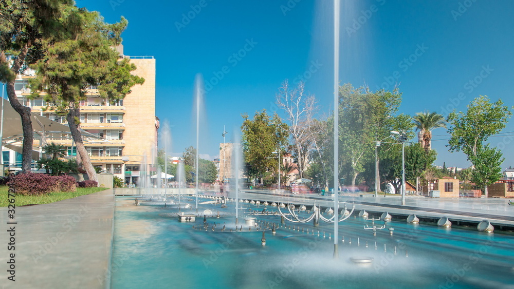 Obraz premium Singing and dancing fountains timelapse on the Republic Square. Antalya, Turkey