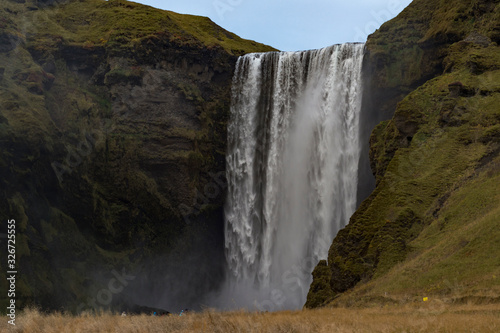 Skogafoss waterfall. Autumn icelandic landscape.