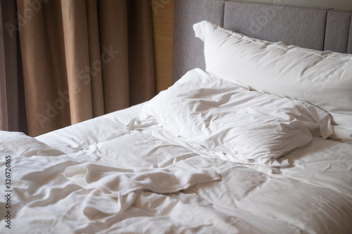 Wrinkle messy blanket in bedroom after waking up