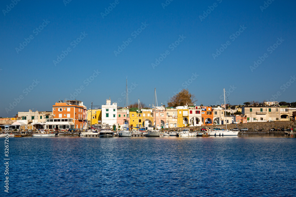 Fototapeta premium Procida (Italy) - Chiaiolella bay with its colored houses is a tourists attraction
