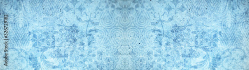 Old blue vintage shabby patchwork tiles stone concrete cement wall texture ba...