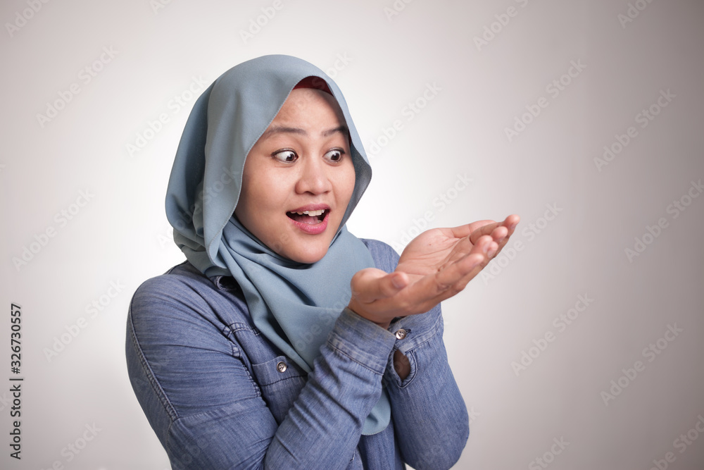 Muslim Lady Shows Something in Her Empty Hands Muslim Lady Shows Something in Her Empty Hands