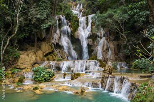 Fototapeta Naklejka Na Ścianę i Meble -  Kuang Si Waterfalls clear waters in area Luang prabang, Laos