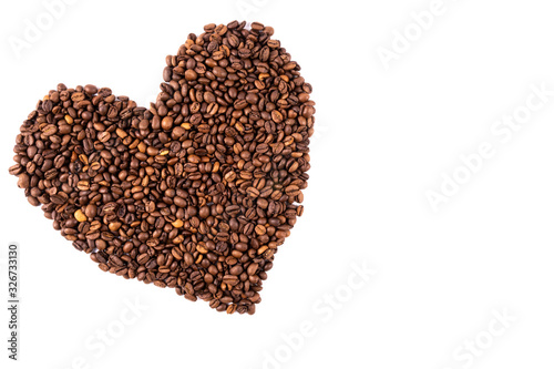 heart made of scattered coffee beans