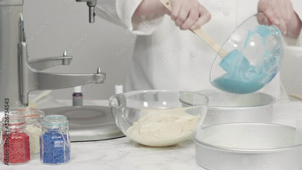 Step by step. Mixing food coloring into a cake batter to bake a three-layer vanilla cake.Step by step. Mixing food coloring into a cake batter to bake a three-layer vanilla cake. Step by step. Mixing food coloring into a cake batter to bake a three-layer vanilla cake.Step by step. Mixing food coloring into a cake batter to bake a three-layer vanilla cake.