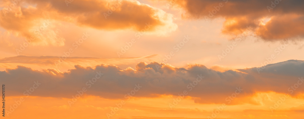Beautiful colorful bright sunset sky with clouds. Nature sky background. 
