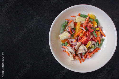 frozen vegetables mix salad onion, corn, pepper, paprika, mushrooms, asparagus beans, carrot and others, ketogenic diet menu concept. food background. top view. copy space