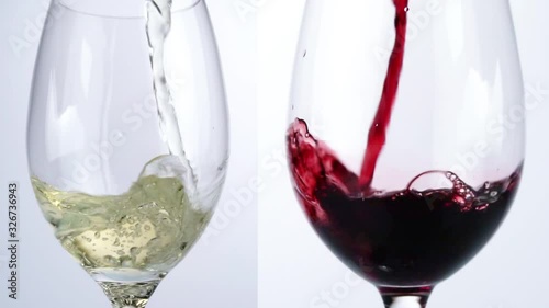 Pour red and white Wine out of a Bottle in a Glass on white Background