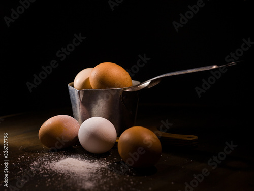 Eggs in the old-fasion metal bowl