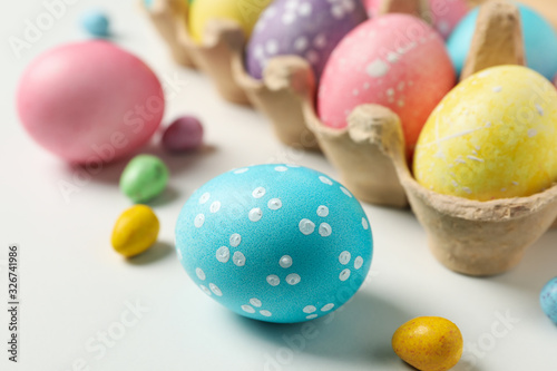 Multicolor Easter eggs on white background, close up
