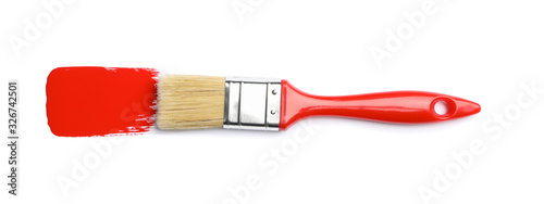Brush with red paint isolated on white background