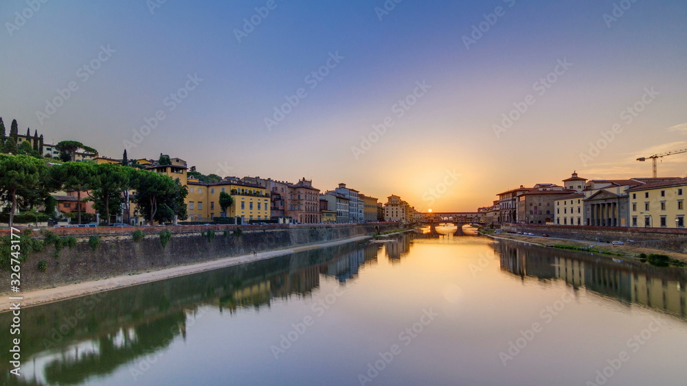 Sunset view of Florence Ponte Vecchio over Arno River in Florence timelapse, Italy.