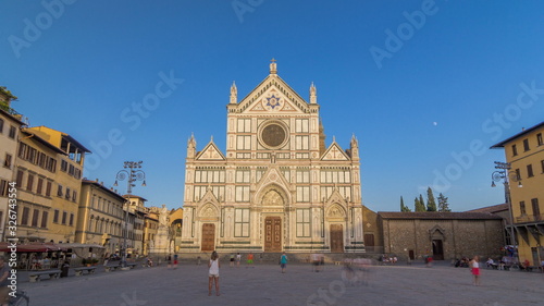 Tourists on Piazza di Santa Croce timelapse  with Basilica di Santa Croce Basilica of the Holy Cross in Florence city. photo