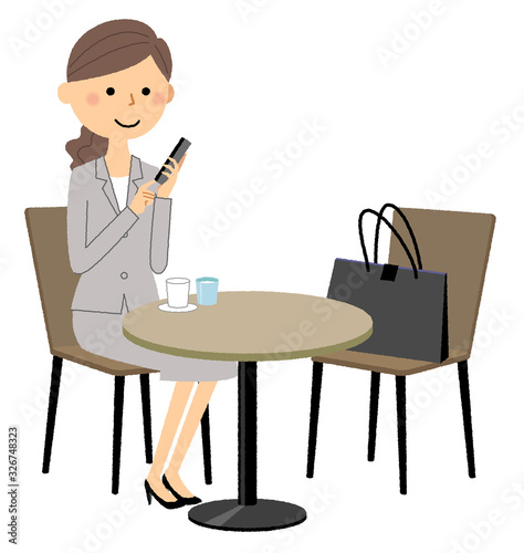 スーツの女性　カフェ　休憩