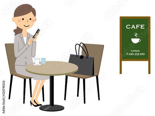スーツの女性　カフェ　休憩