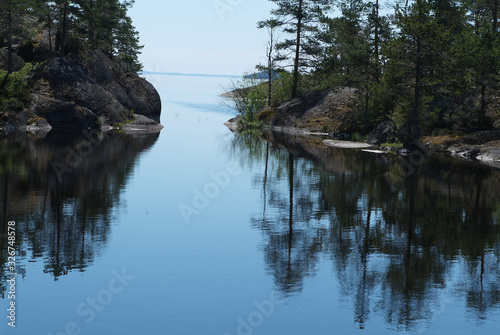 Fototapeta Naklejka Na Ścianę i Meble -  Travel to Russia. Ladoga skerries- hiking on the lake. Nature landscape- national park