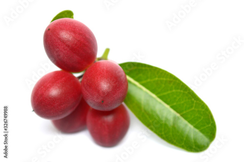 Karanda fruit (Carissa carandas) on white background